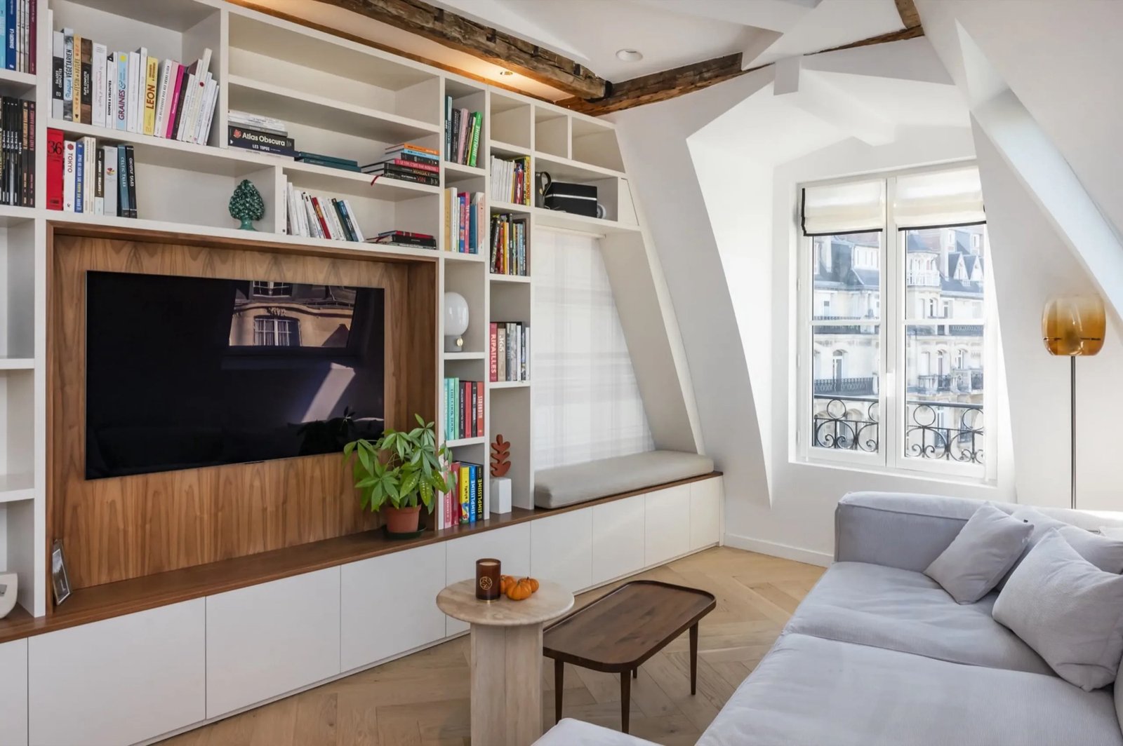Solid oak custom bookcase in a Haussmann living room