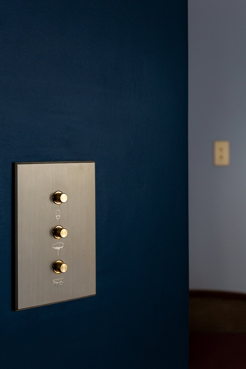 Brushed brass switches — Paris 16th