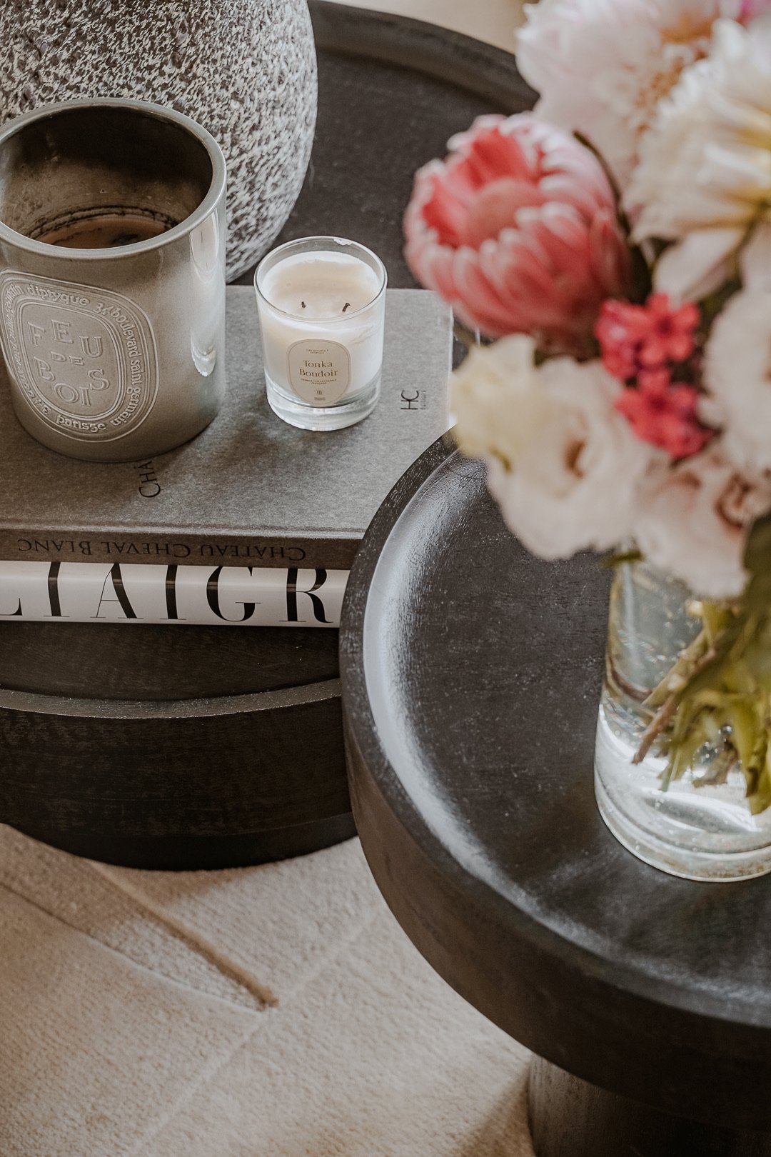Candle and flowers on table detail — Paris 7th