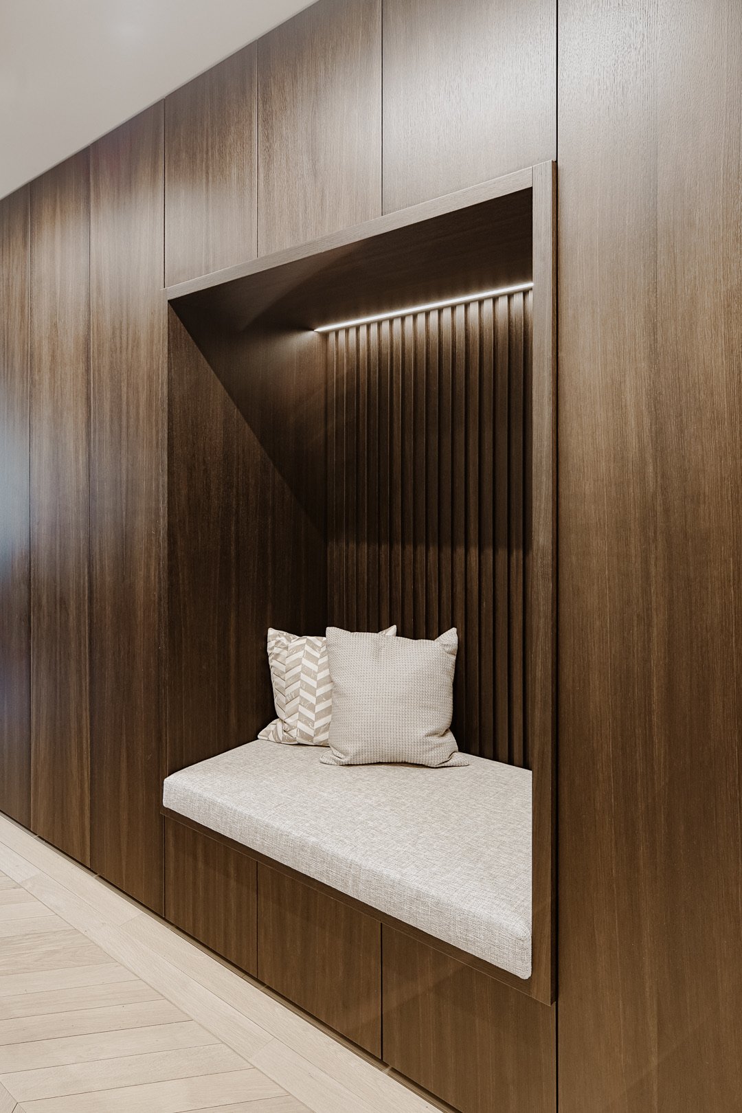 Bedroom dark walnut panel — Paris 7th