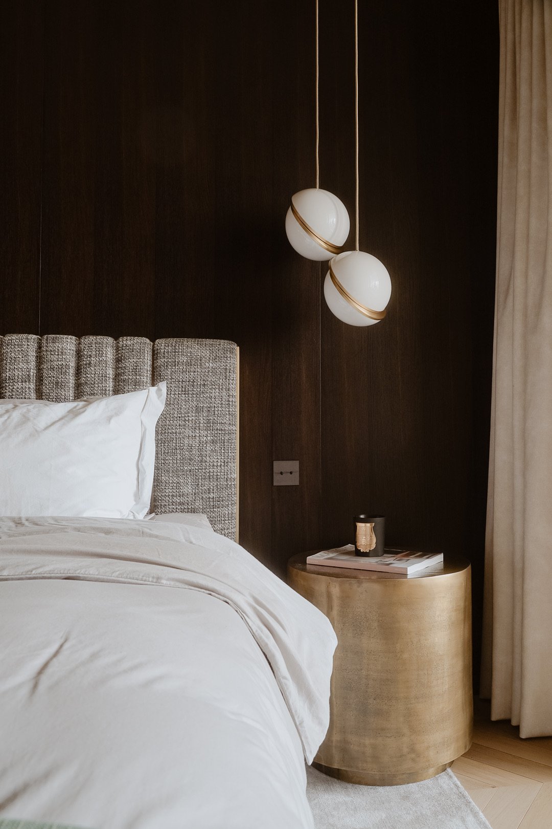 Brass bedside table and opaline pendants — Paris 7th