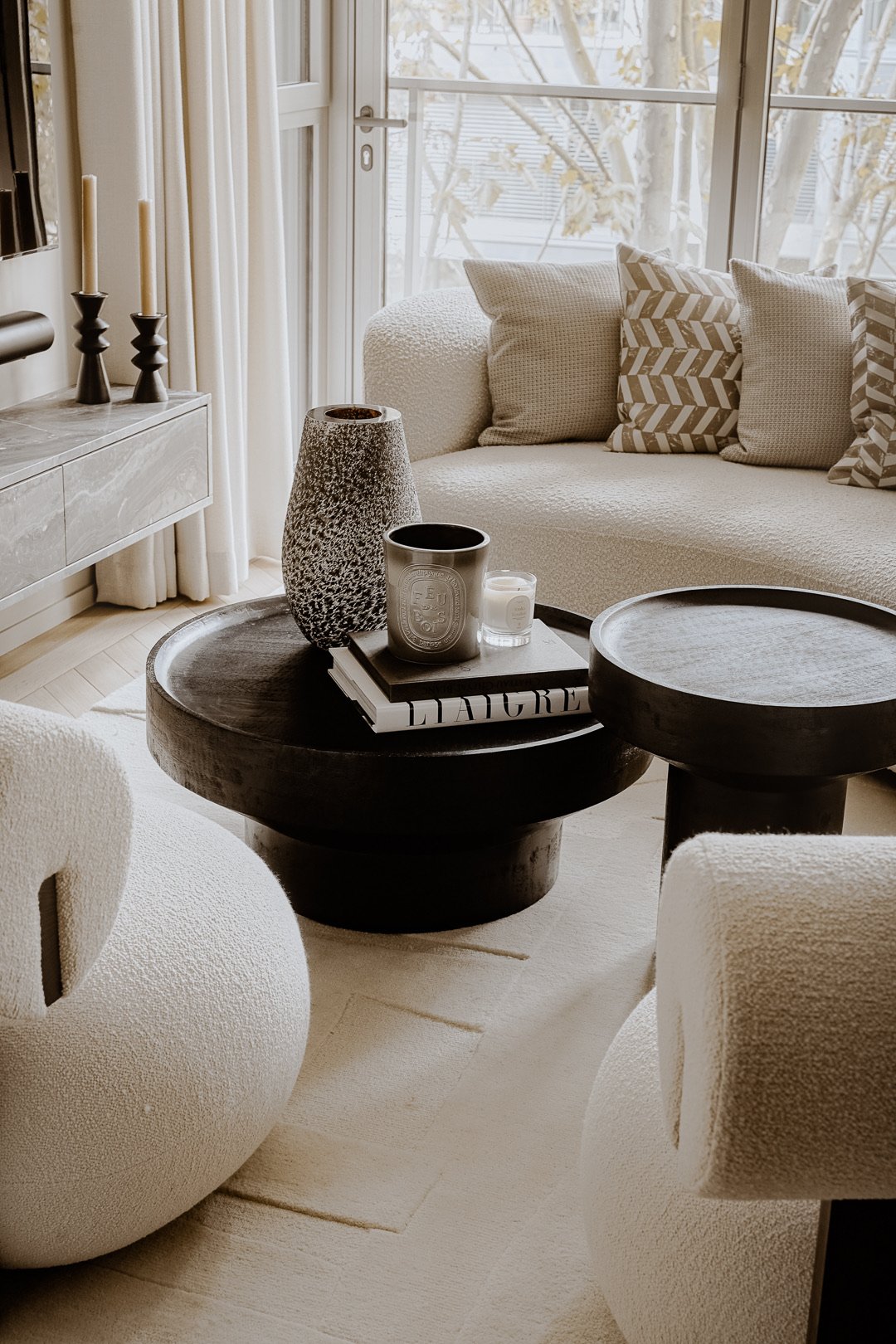 Coffee table and boucle sofa detail — Paris 7th