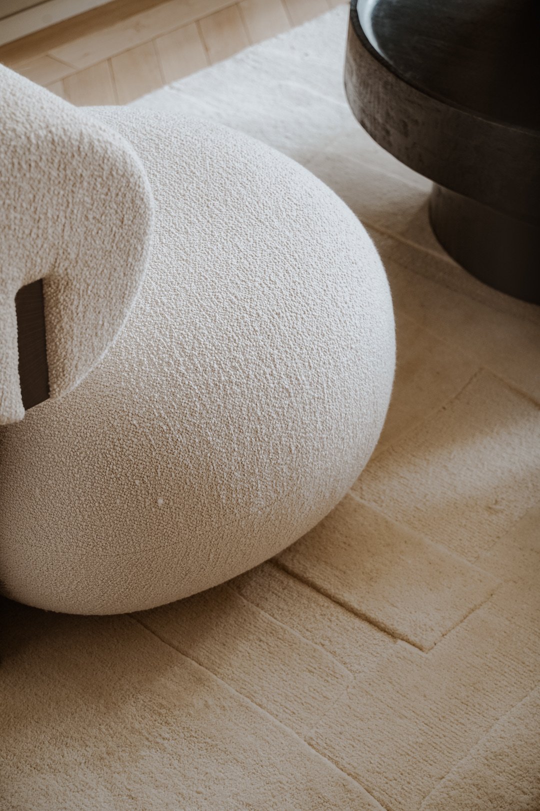 Boucle armchair walnut base — Paris 7th