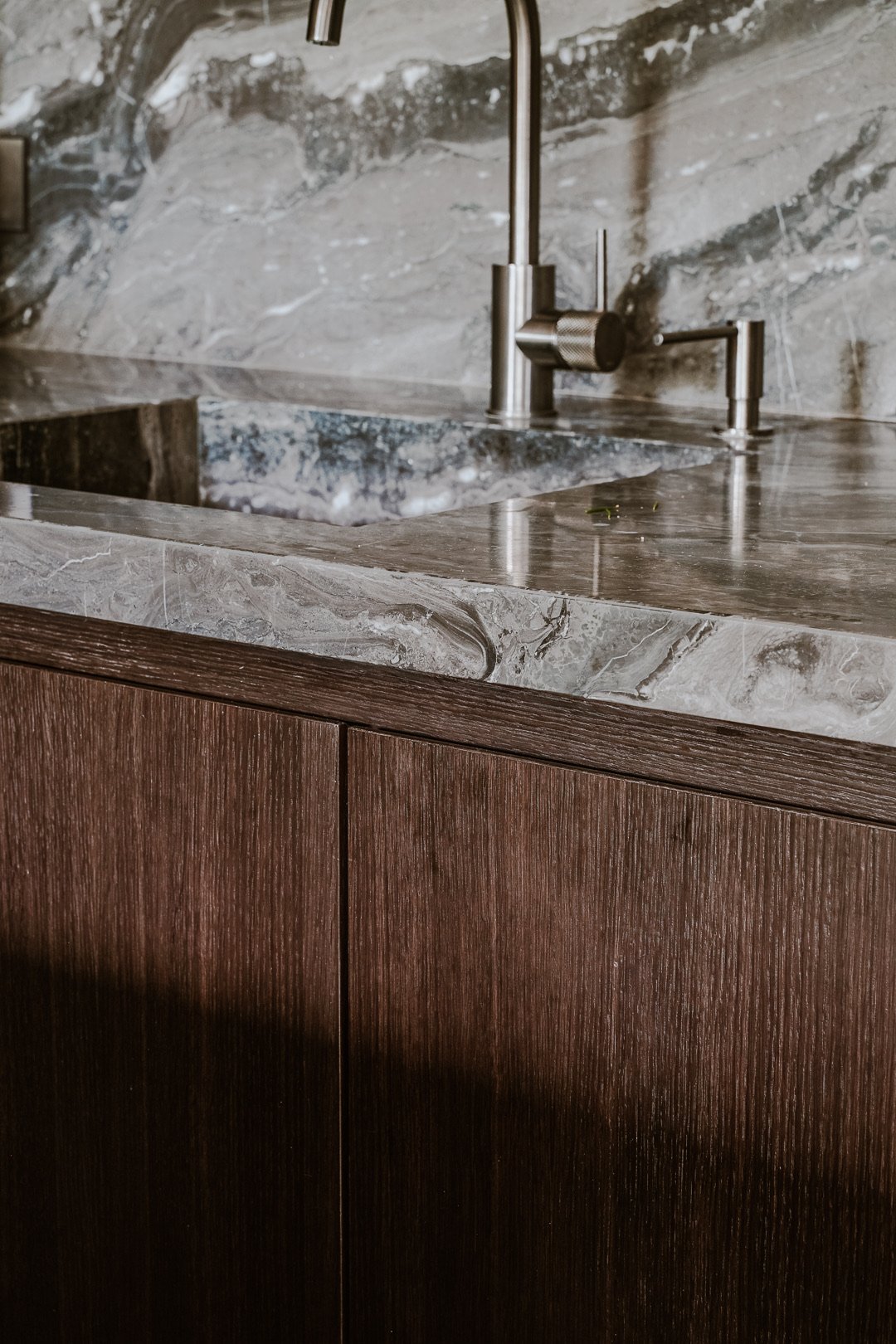 Grey marble table and design objects — Paris 7th