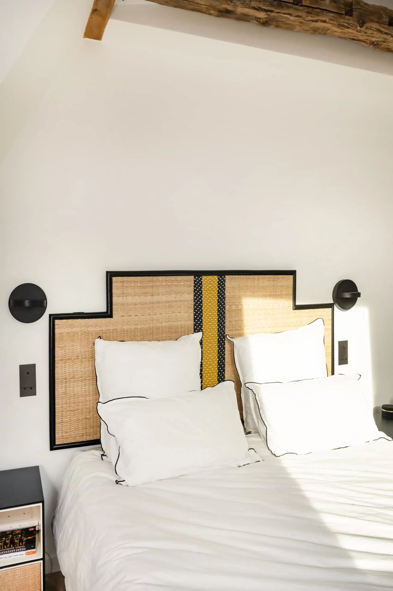 Bedroom cane headboard and beams — Paris 17th