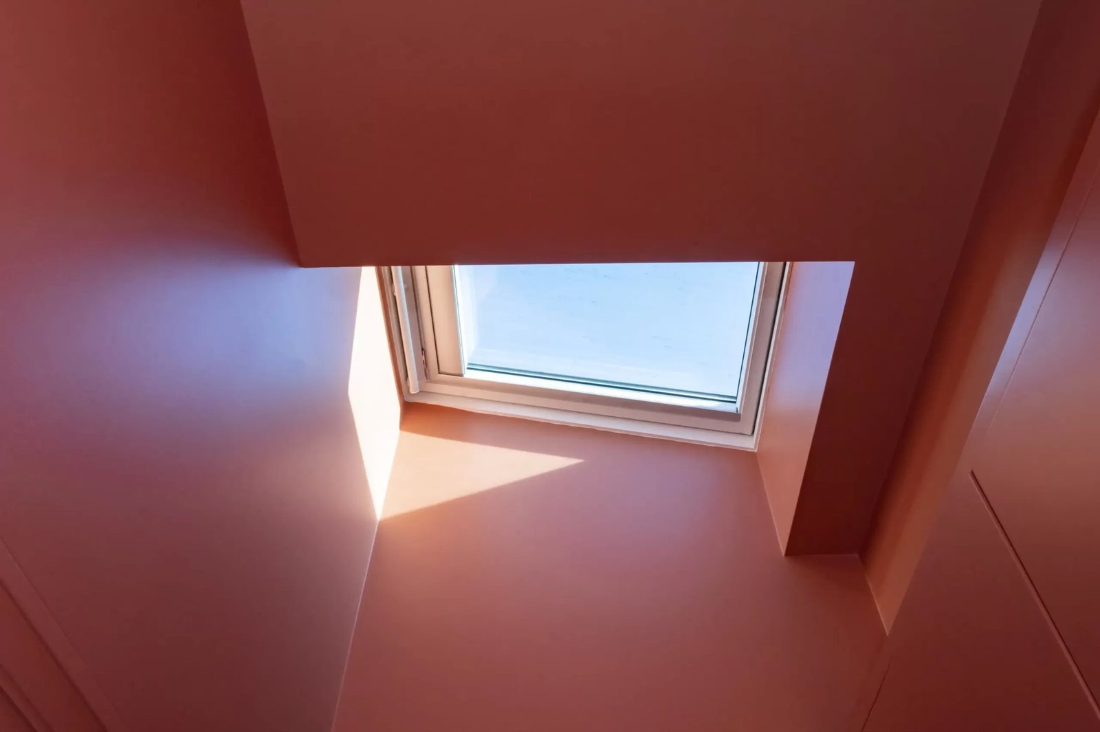 Terracotta pink skylight — Paris 17th