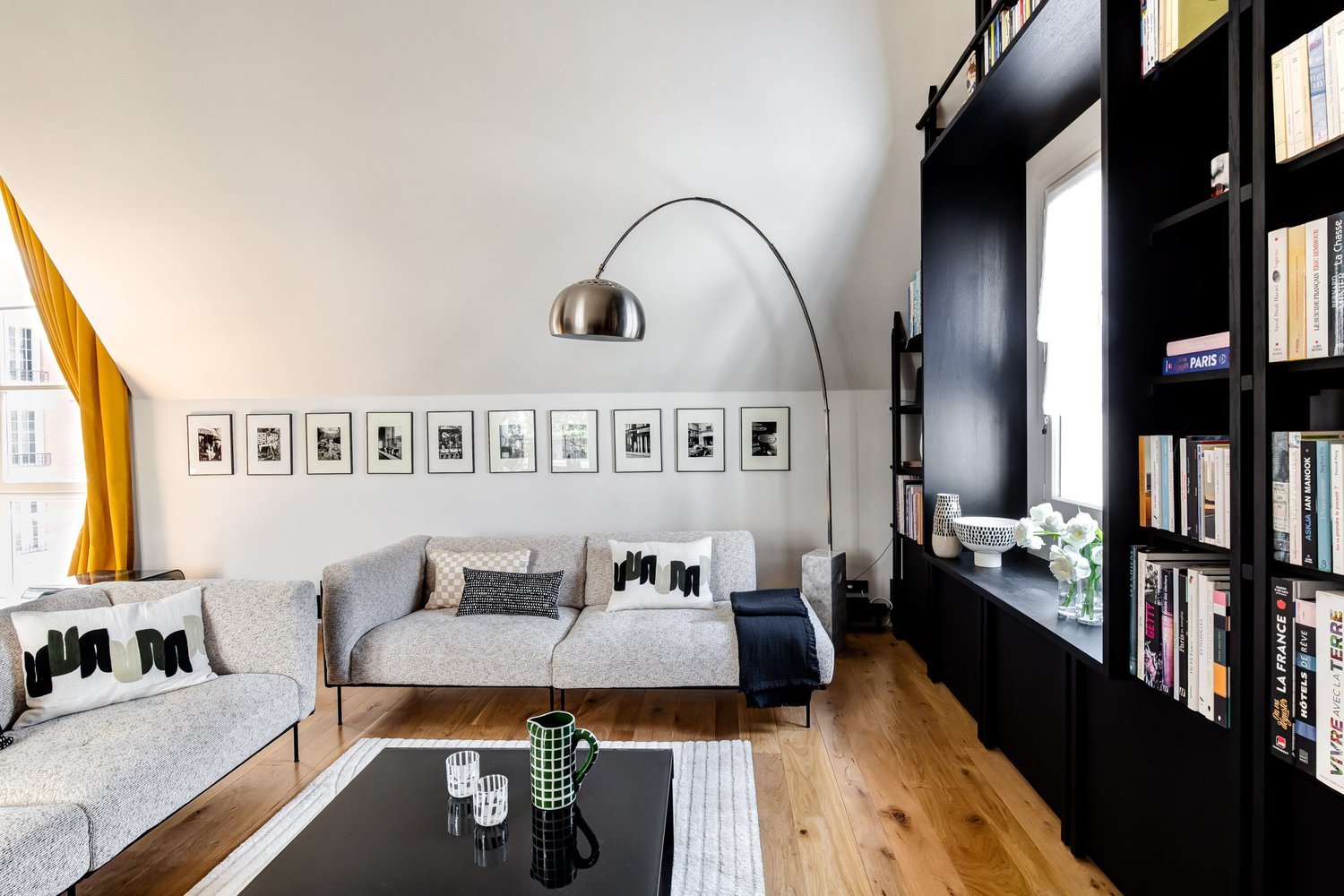 Sofa and B&W photos — Le Marais