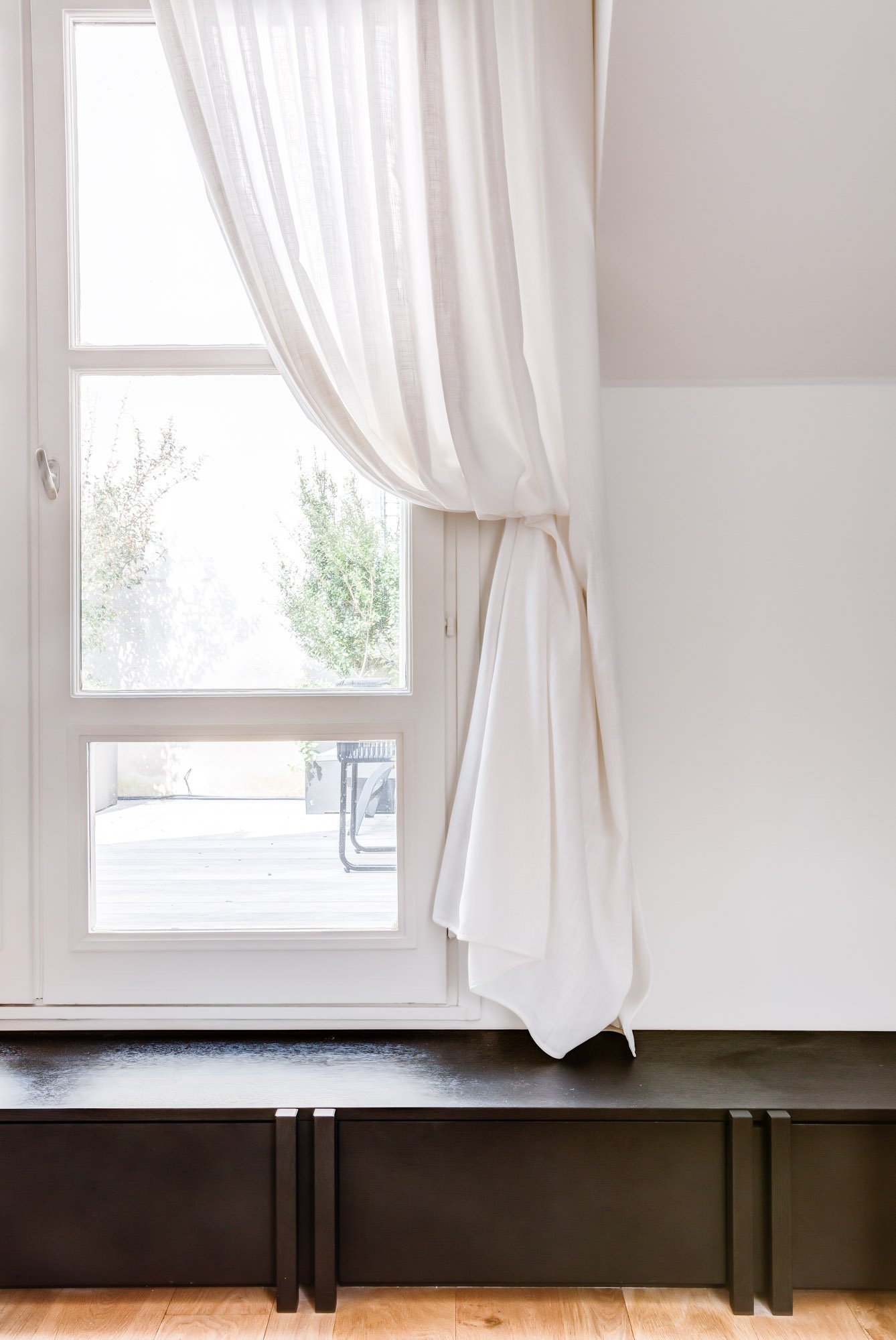 Bench and linen curtains — Le Marais