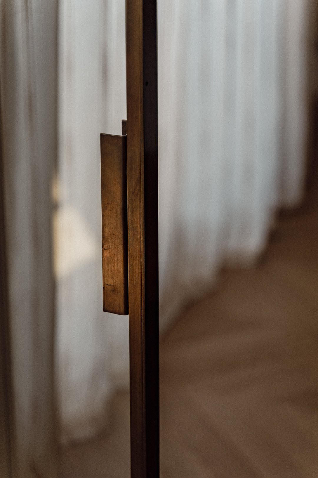 Glass partition brass handle — Trocadero