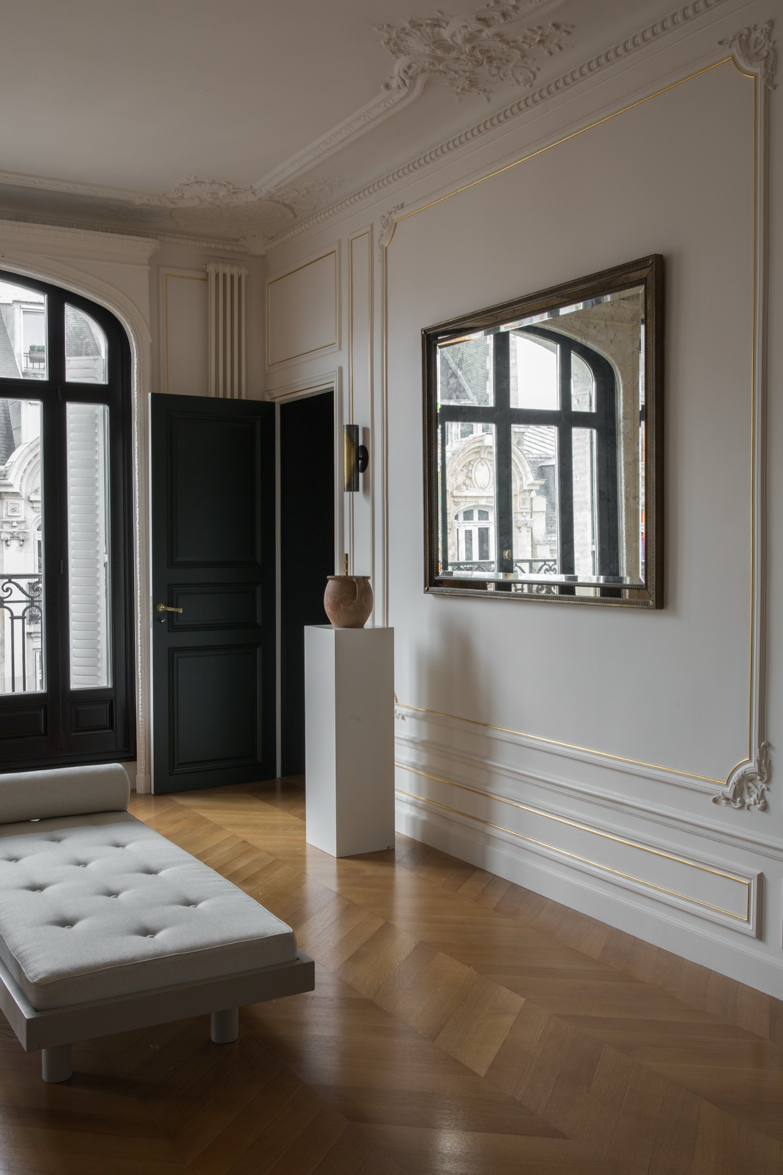 Mouldings and sconce detail — Paris 8th